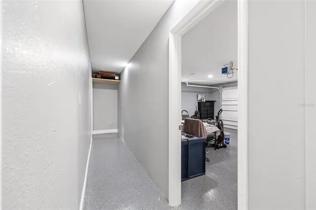 a view of a bedroom from a hallway