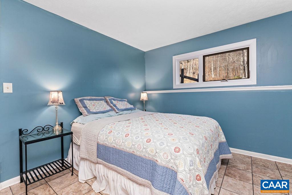 464 3 Ridges Roseland, VA 22967 - Photo 14 of 29 a bedroom with a bed and a window