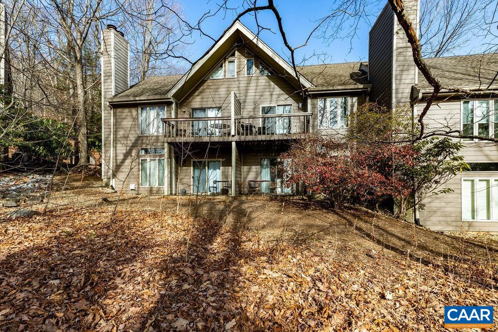 464 3 Ridges Roseland, VA 22967 - Photo 3 of 29 a front view of a house with a garden
