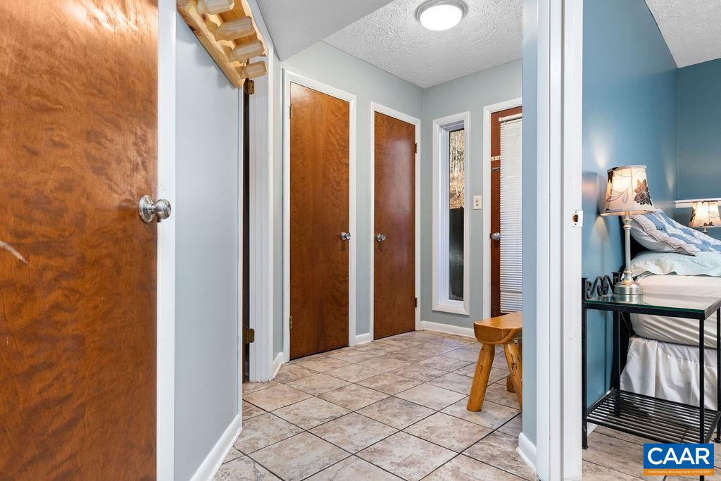 464 3 Ridges Roseland, VA 22967 - Photo 6 of 29 a view of a hallway with front door