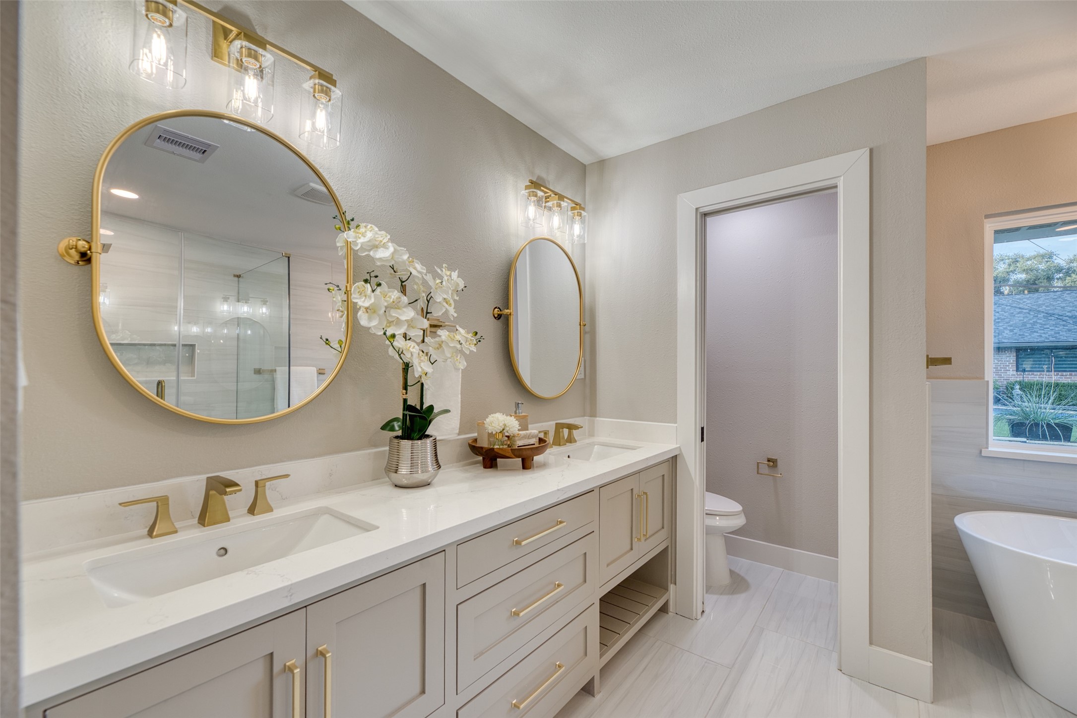 7602 Pagewood Lane Houston, TX 77063 - Photo 22 of 33 Spa-inspired bathroom offers a serene retreat.