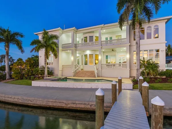 a view of a lake with a big yard