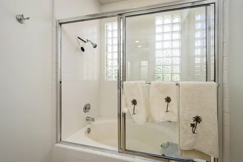 a utility room with sink dryer and washer