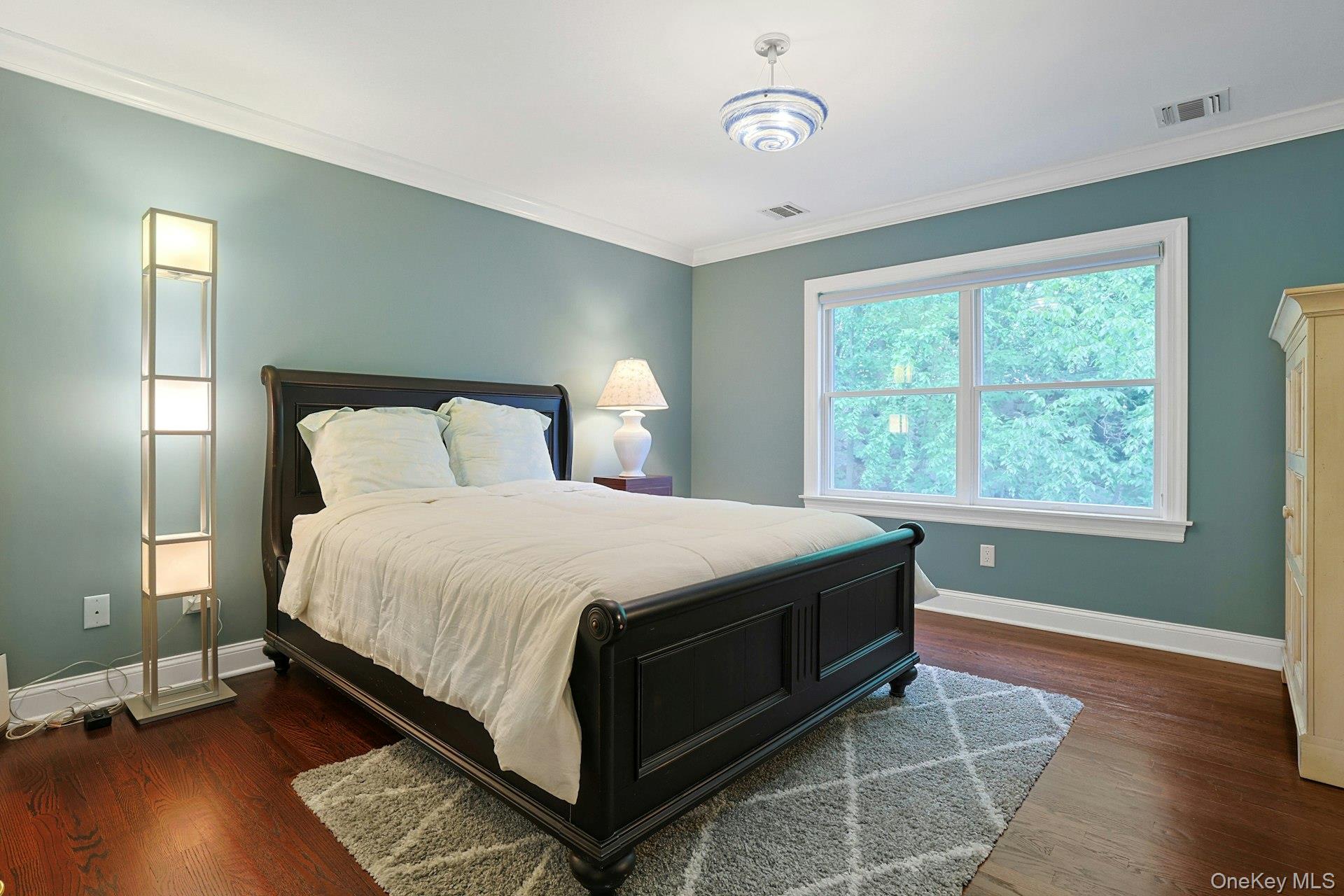 17 Hammond Ridge Road Bedford Corners, NY 10549 - Photo 18 of 36 Bedroom featuring wood floors, double door closer and crown molding.