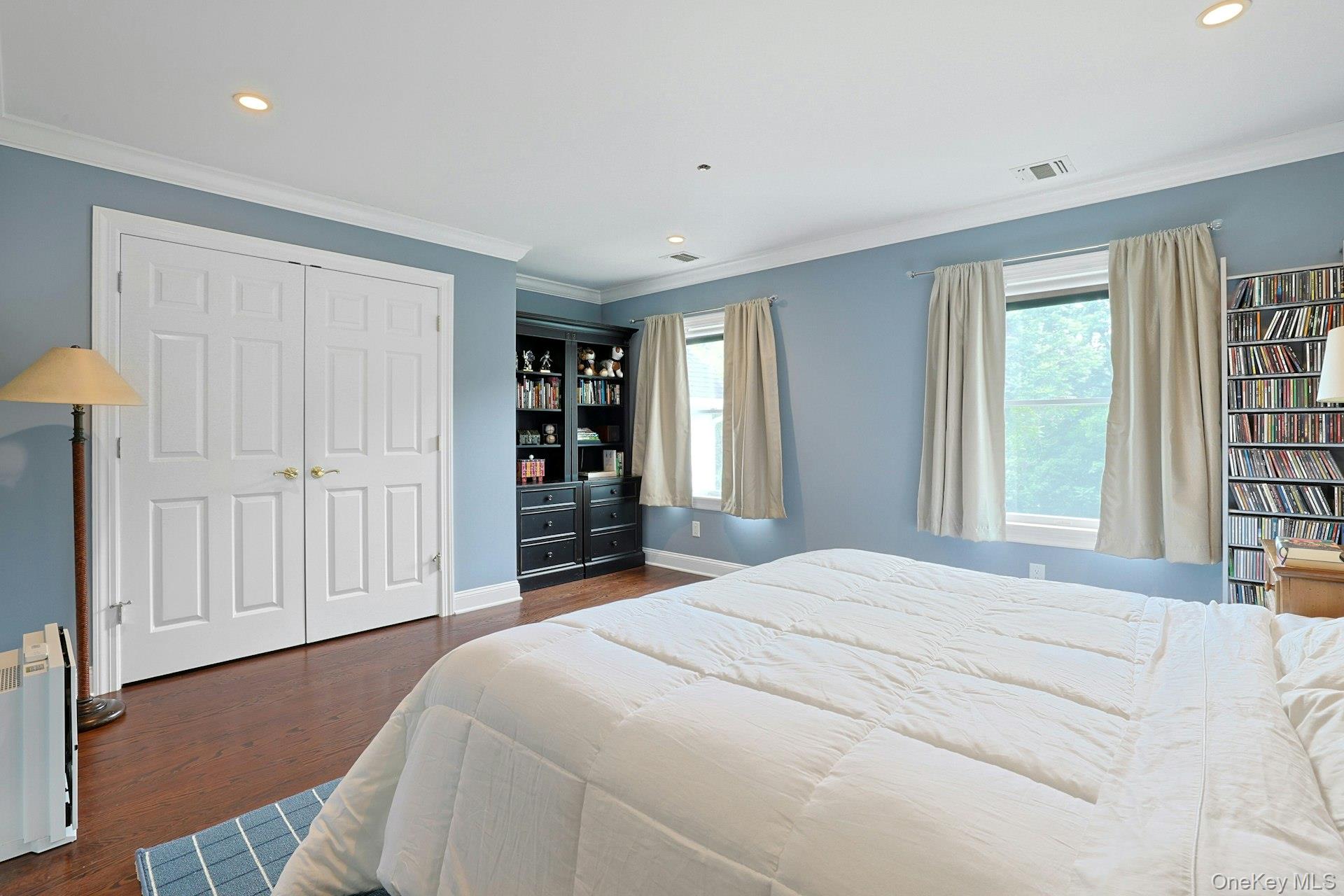 17 Hammond Ridge Road Bedford Corners, NY 10549 - Photo 20 of 36 Bedroom featuring recessed lighting, moldings, wood floors and double door closet.