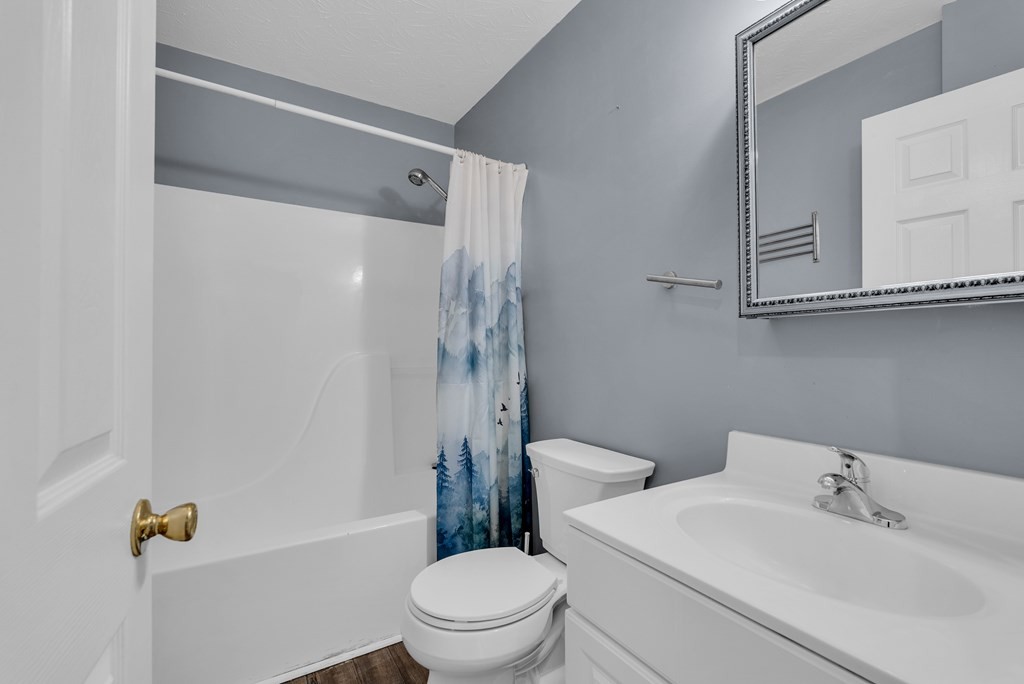 164 Prosperity Lane Sparta, TN 38583 - Photo 25 of 39 a white toilet sitting next to a bath tub
