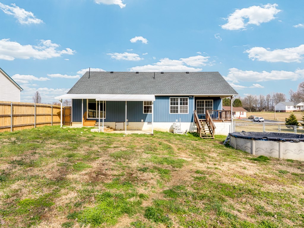 164 Prosperity Lane Sparta, TN 38583 - Photo 26 of 39 a front view of a house with a garden and lake view
