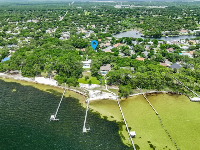 a view of a lake with a yard