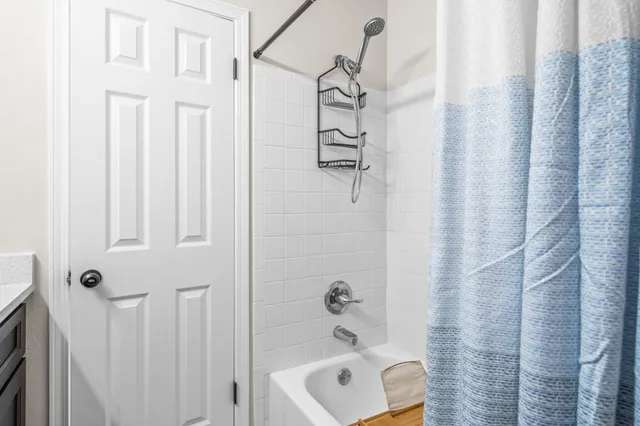 a view of a kitchen with furniture and a window