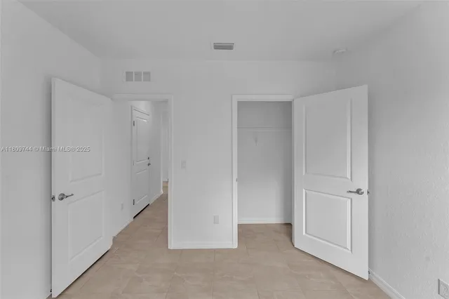 a view of a kitchen with a sink
