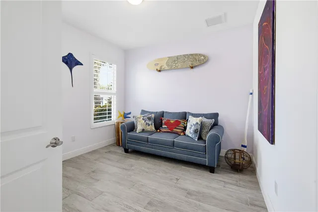 a room with furniture and window