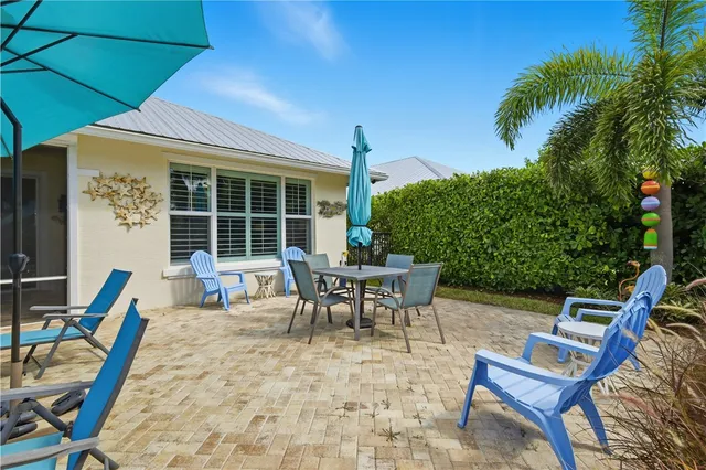 a view of a swimming pool with a patio