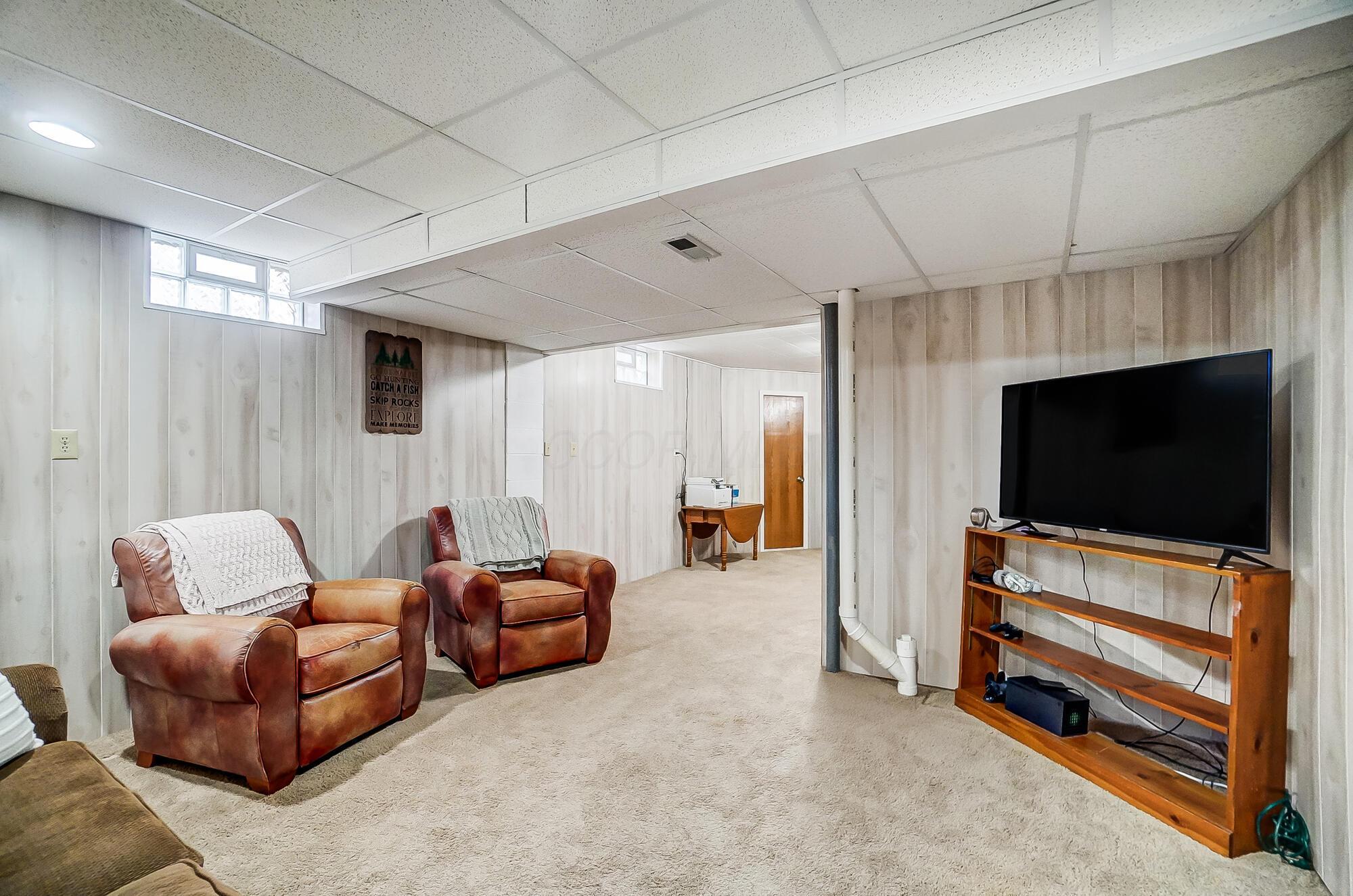 5337 Sutter Home Road Hilliard, OH 43026 - Photo 54 of 72 Finished area in the basement adds extra space for a home office and entertainment room!