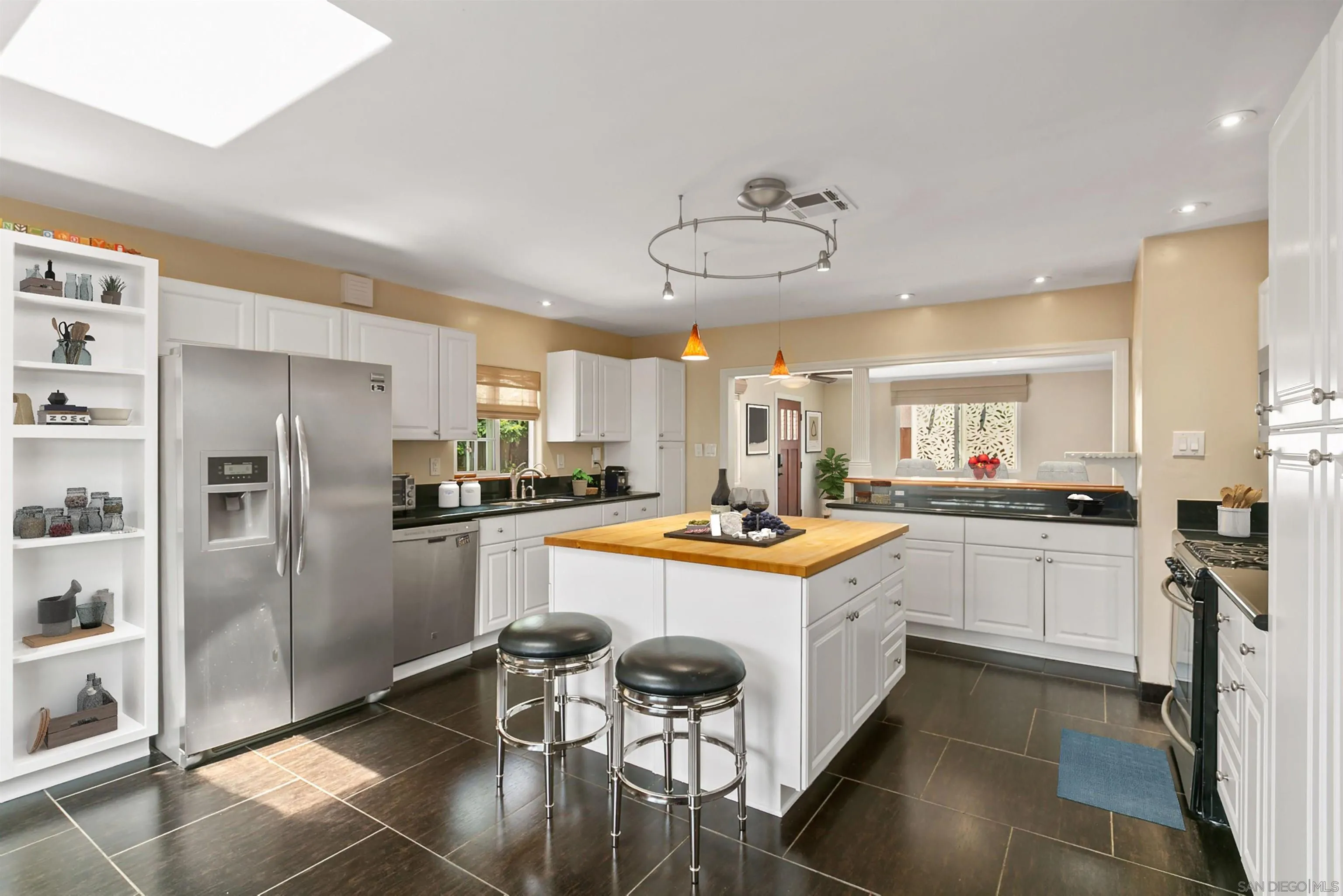 329 Rancho Santa Fe Road Encinitas, CA 92024 - Photo 1 of 21 a kitchen with stainless steel appliances granite countertop a sink and cabinets