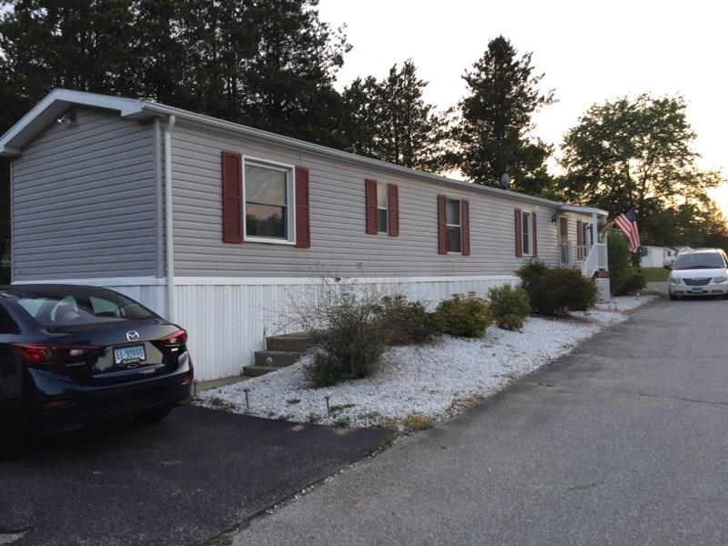 1010 Long Cove Road Ledyard, CT 06335 - Photo 1 of 1 a car parked in front of a house