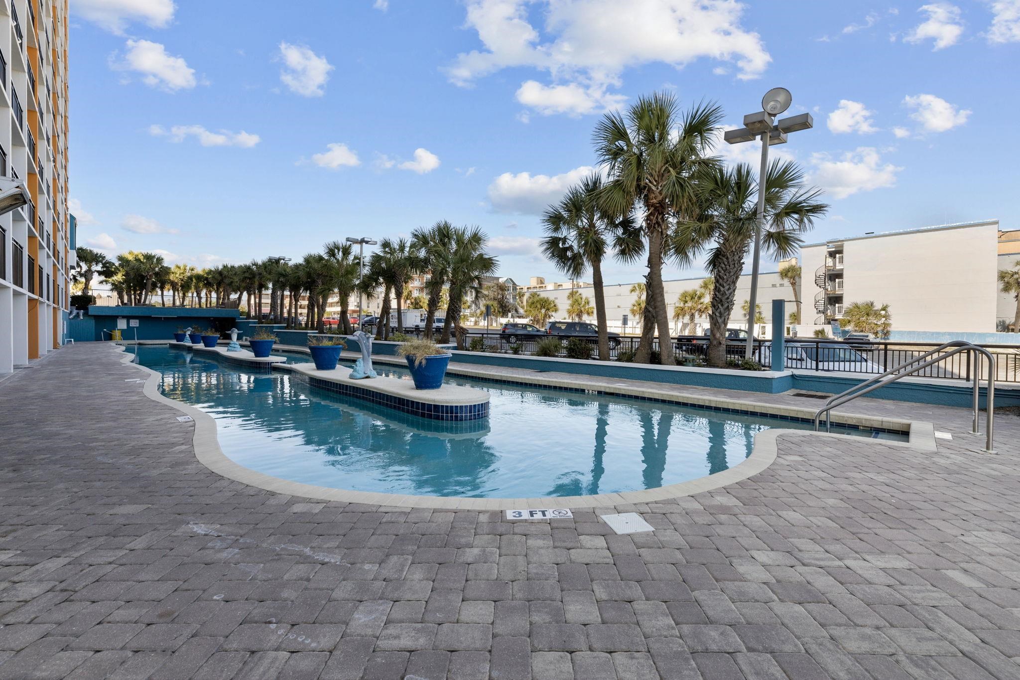 1501 South Ocean Boulevard, Unit 910 Myrtle Beach, SC 29577 - Photo 20 of 31 Community pool featuring a patio