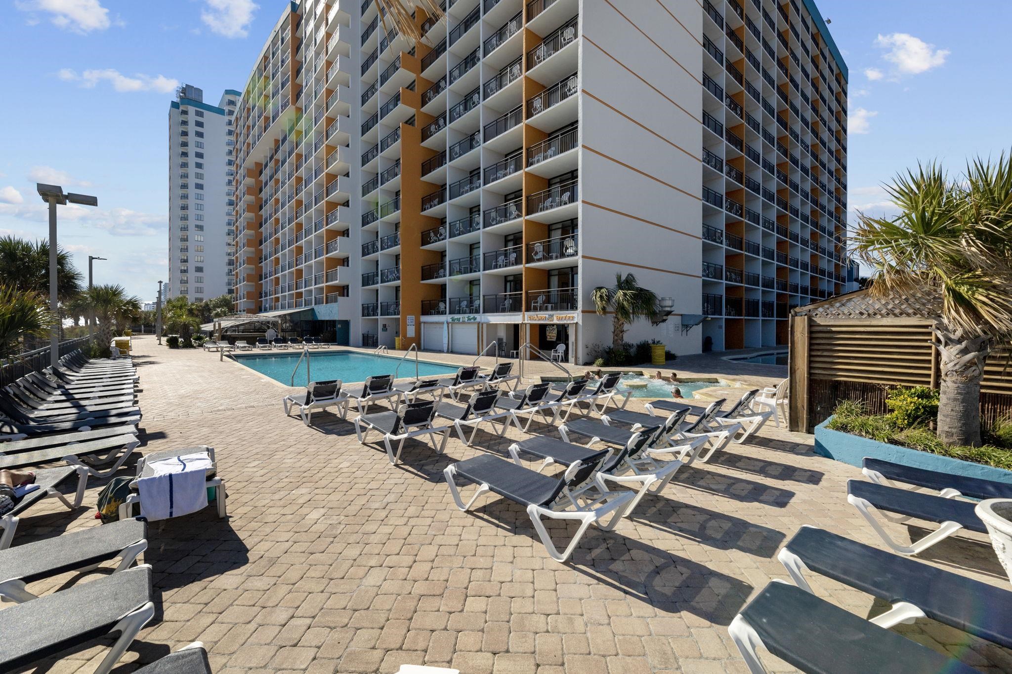 1501 South Ocean Boulevard, Unit 910 Myrtle Beach, SC 29577 - Photo 25 of 31 Community pool with a patio area