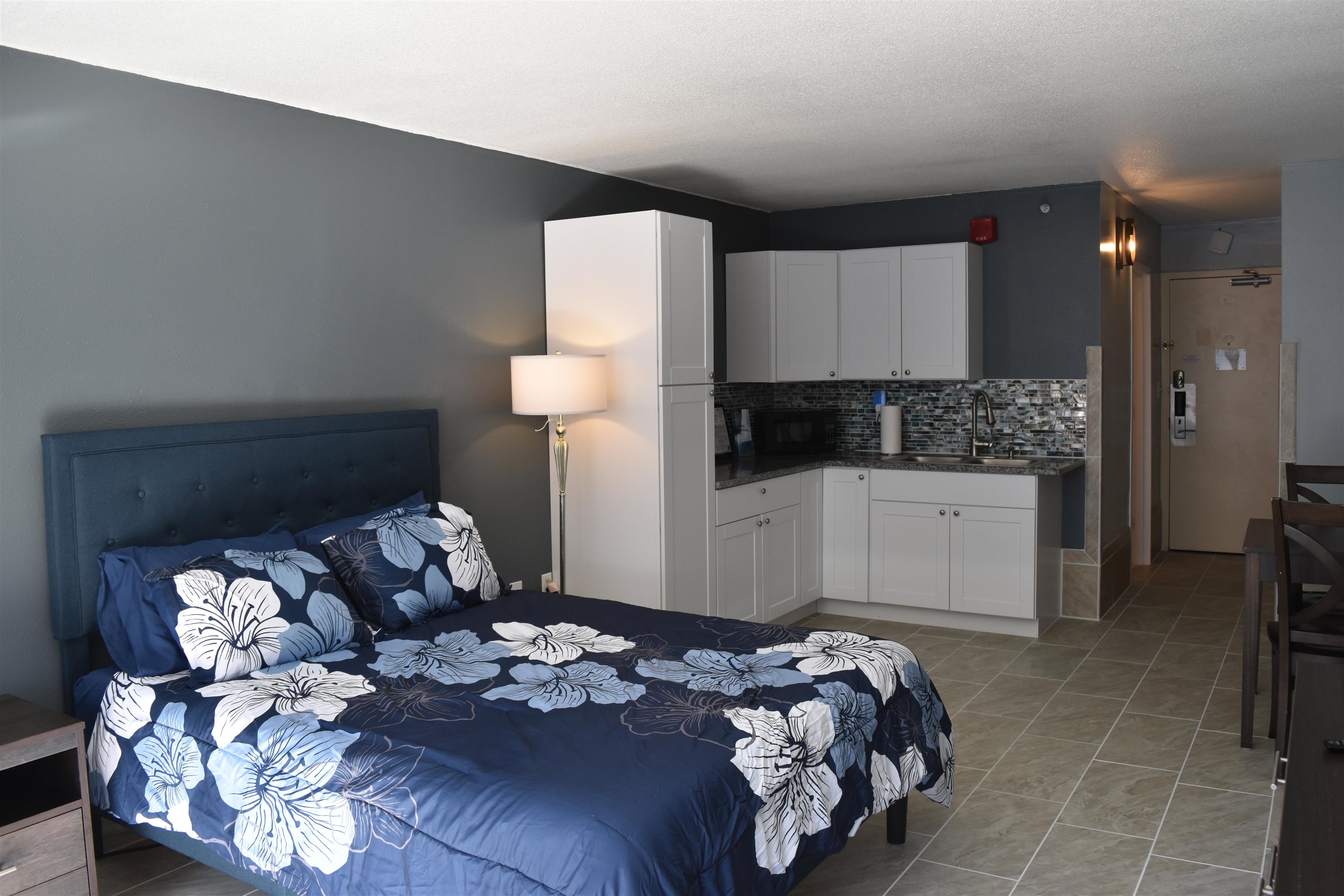 1501 South Ocean Boulevard, Unit 910 Myrtle Beach, SC 29577 - Photo 7 of 31 Bedroom with light tile patterned floors and a sink