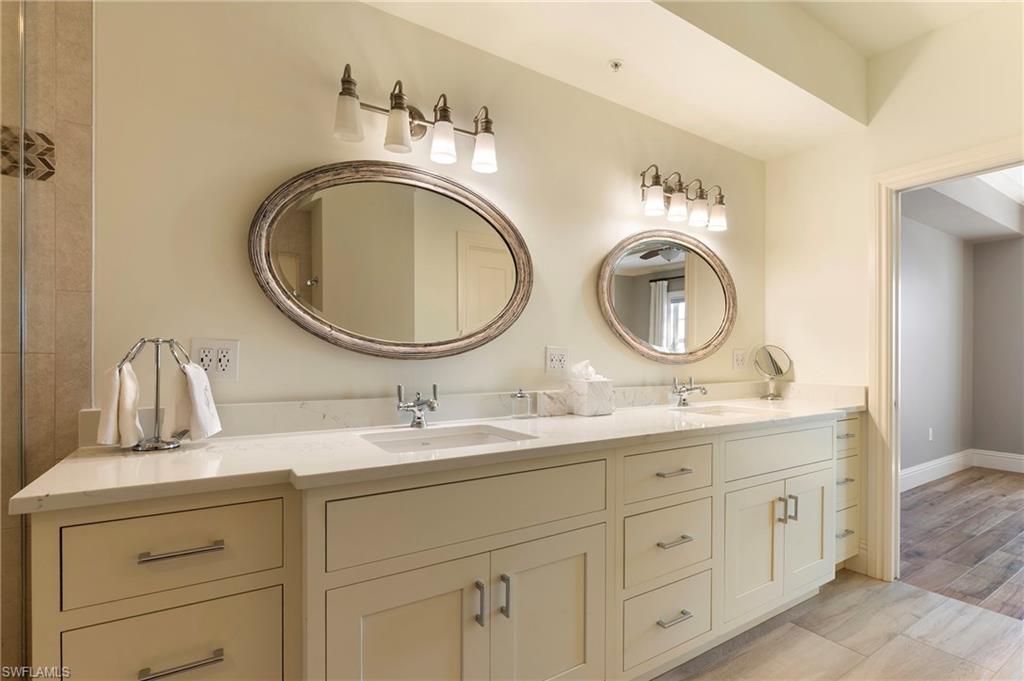 451 Bayfront Place, Unit 5407 Naples, FL 34102 - Photo 22 of 38 Full bath featuring double vanity and light wood finished floors