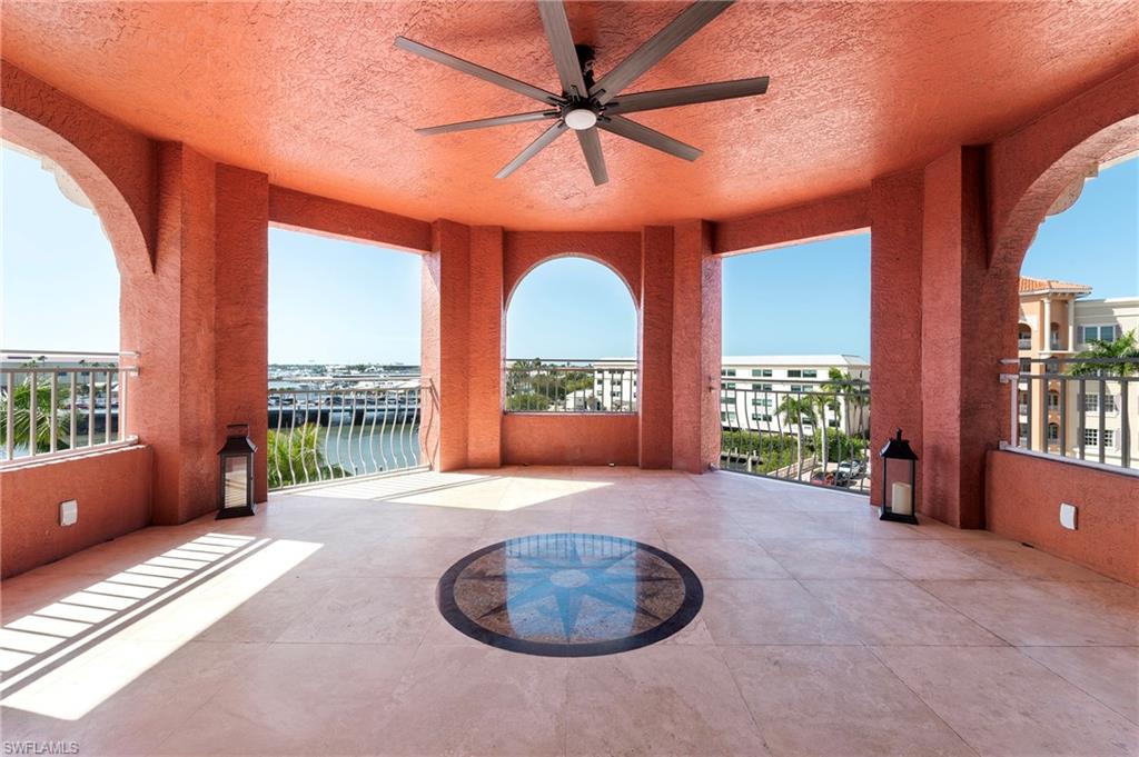 451 Bayfront Place, Unit 5407 Naples, FL 34102 - Photo 30 of 38 View of patio featuring ceiling fan and a water view