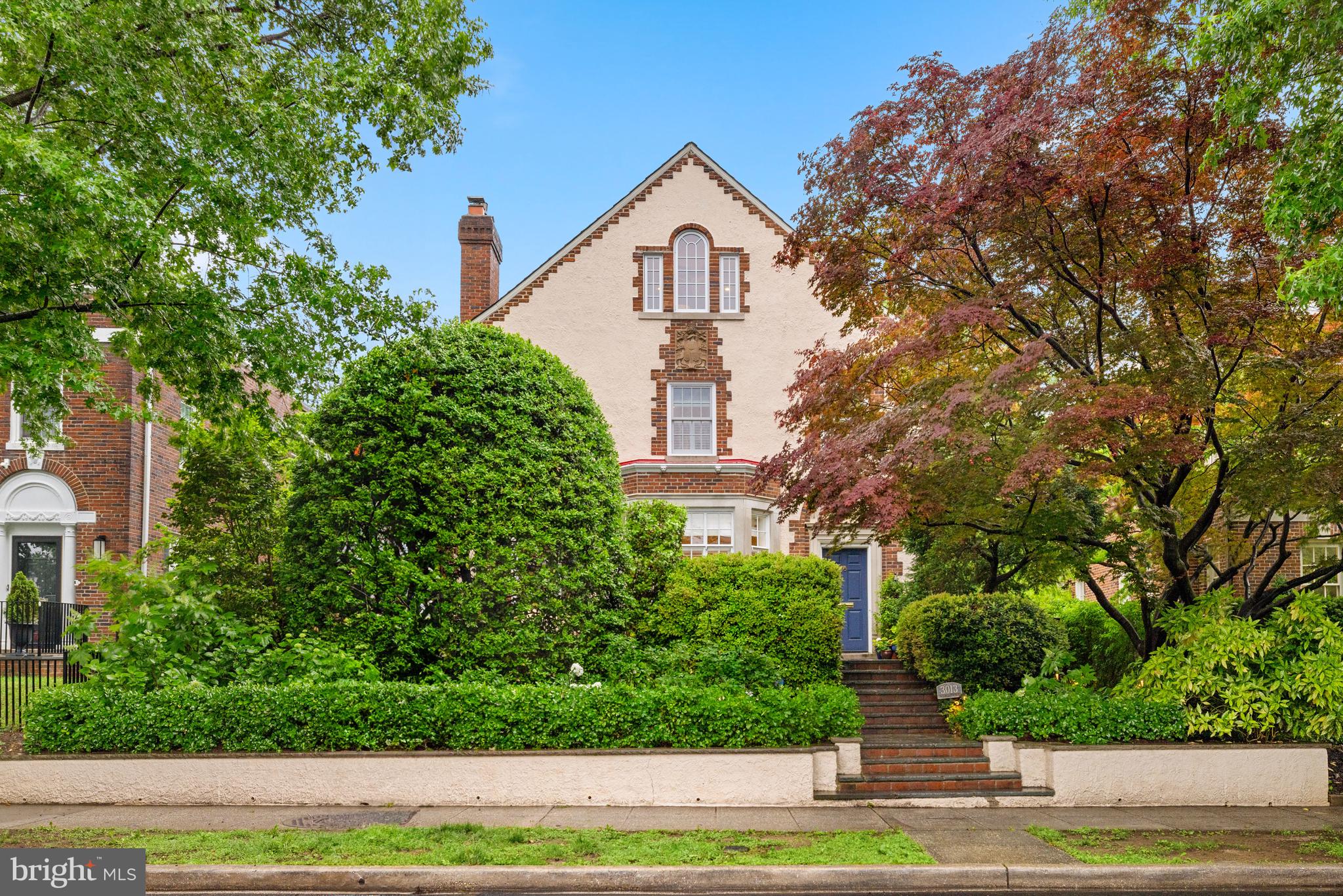 3013 Cathedral Avenue Northwest Washington, DC 20008 - Photo 1 of 33 a front view of a house with a yard