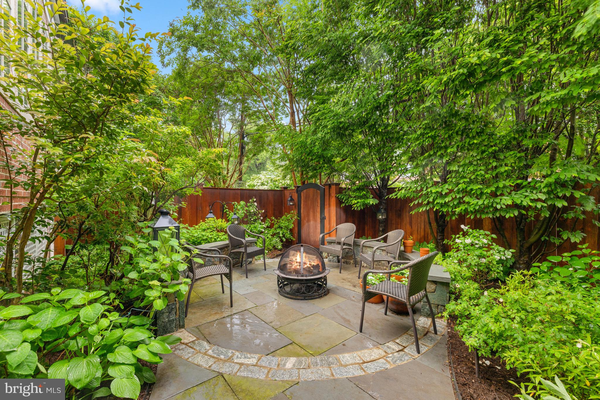 3013 Cathedral Avenue Northwest Washington, DC 20008 - Photo 16 of 33 a view of a backyard with chair and potted plants