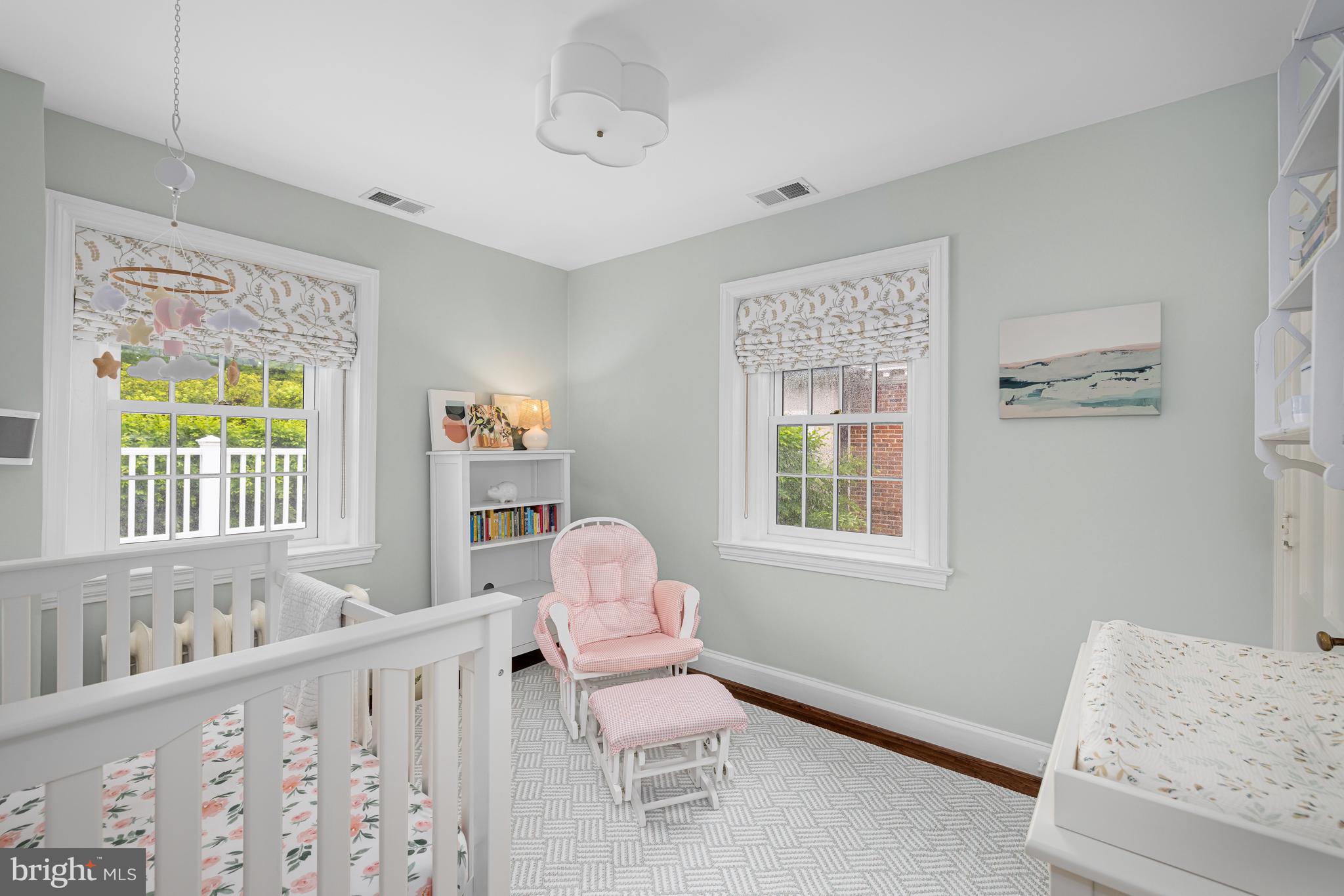 3013 Cathedral Avenue Northwest Washington, DC 20008 - Photo 24 of 33 a living room with furniture and a window