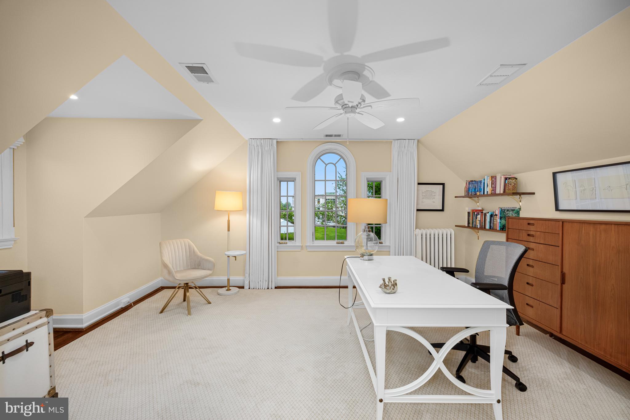 3013 Cathedral Avenue Northwest Washington, DC 20008 - Photo 29 of 33 a living room with furniture a flat screen tv and a table