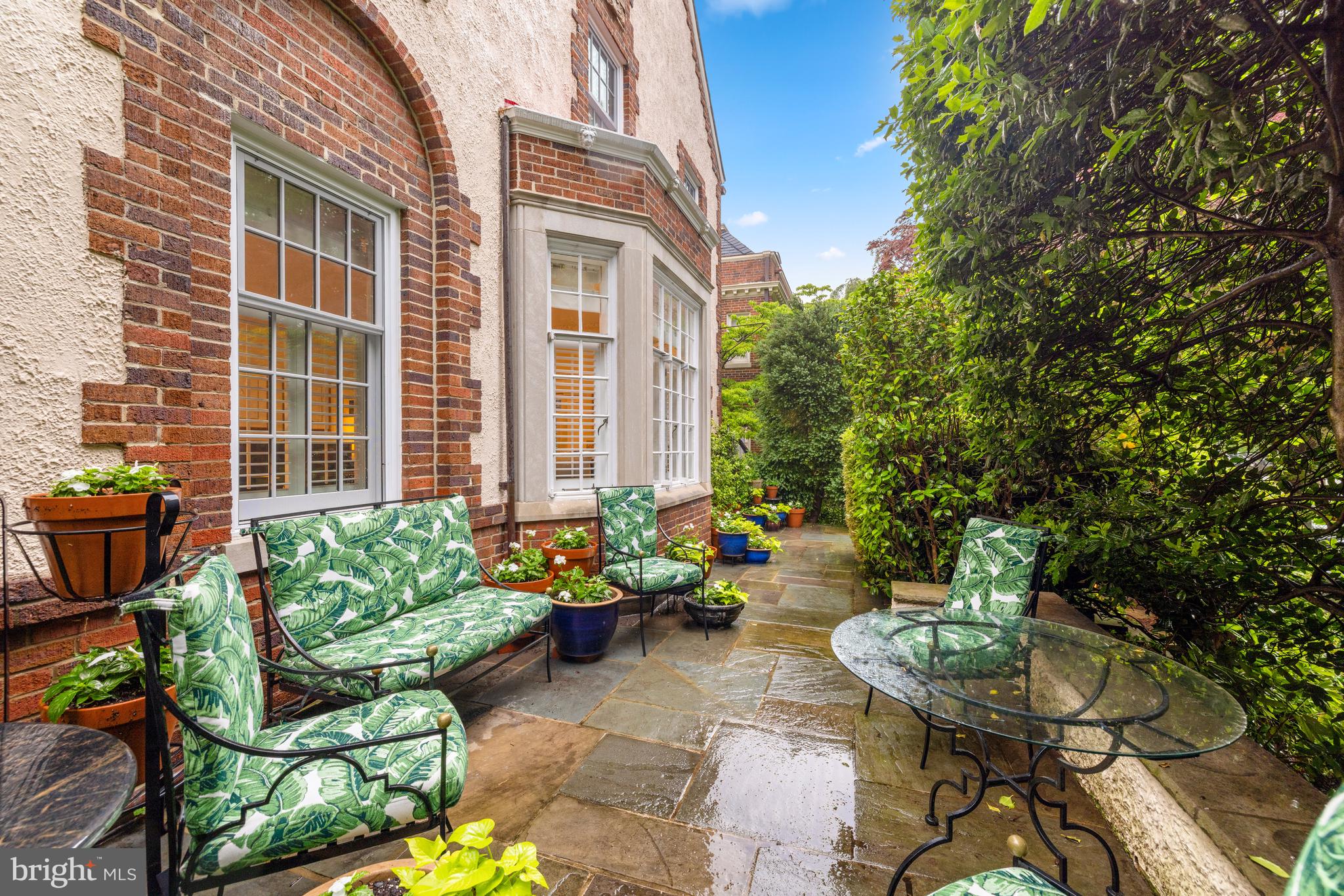 3013 Cathedral Avenue Northwest Washington, DC 20008 - Photo 3 of 33 a view of a house with backyard and sitting area