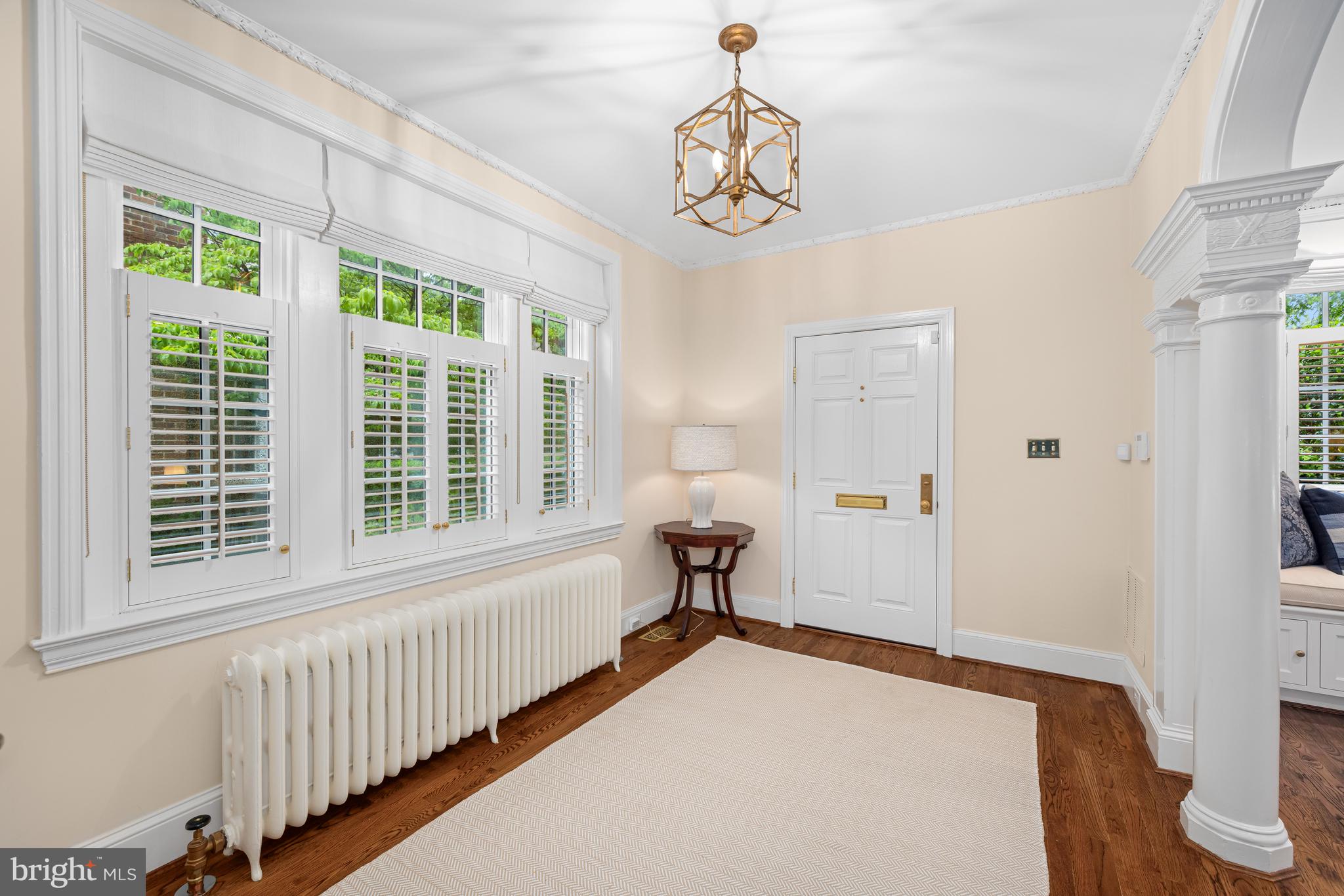 3013 Cathedral Avenue Northwest Washington, DC 20008 - Photo 5 of 33 a bedroom with a bed and a window