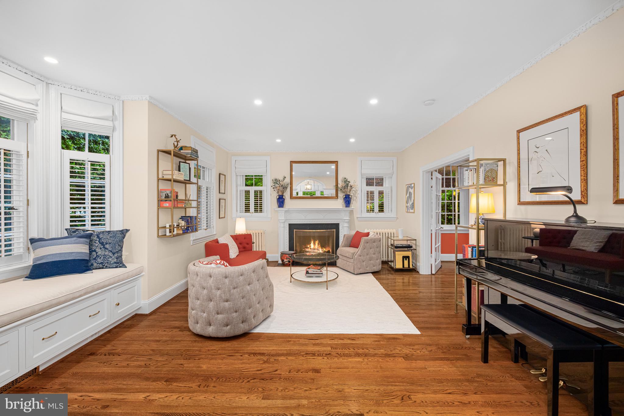 3013 Cathedral Avenue Northwest Washington, DC 20008 - Photo 7 of 33 a living room with furniture and a fireplace