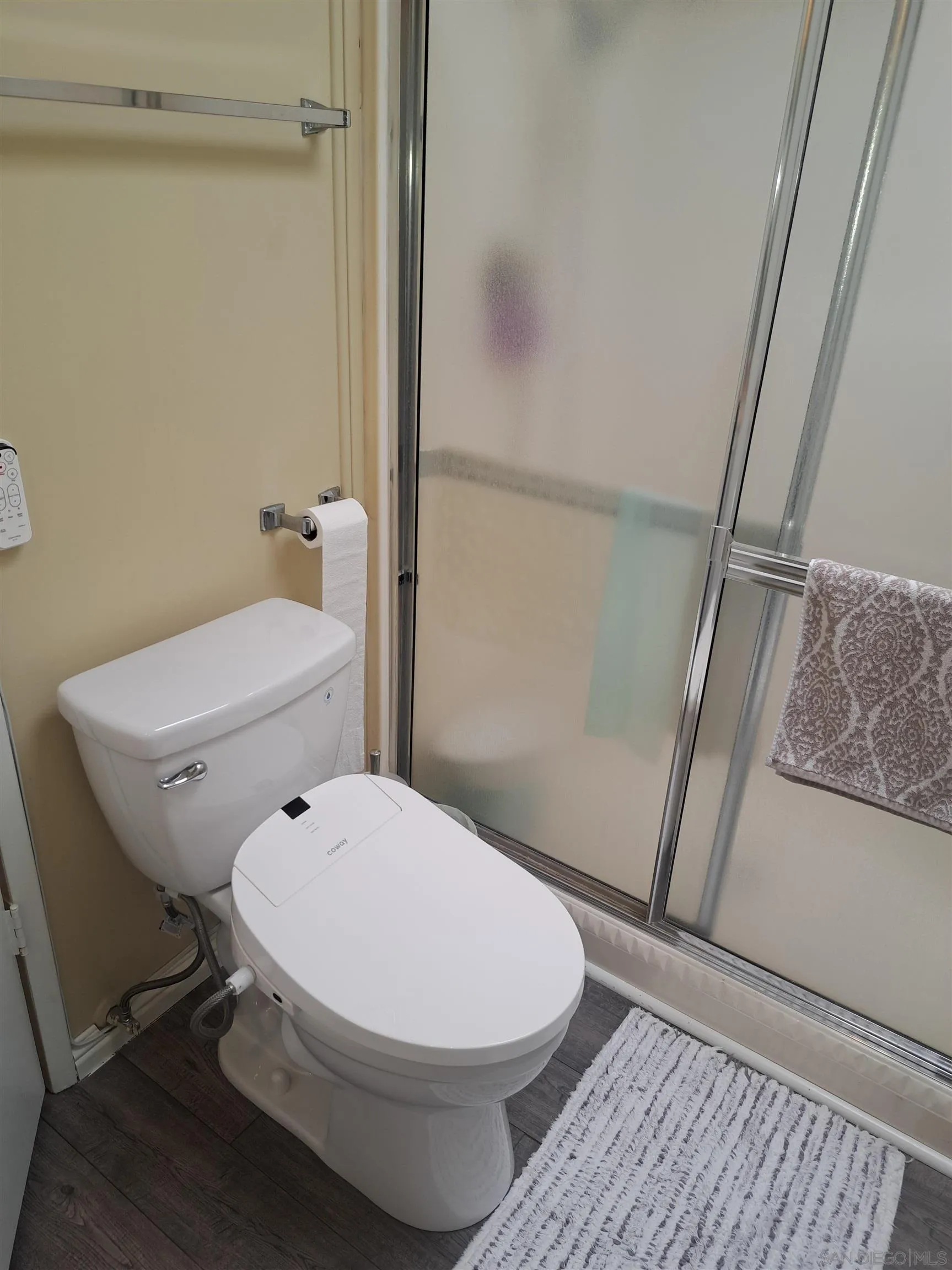 4650 Dulin Road, Unit 12 Fallbrook, CA 92003 - Photo 24 of 36 a white toilet sitting next to a shower