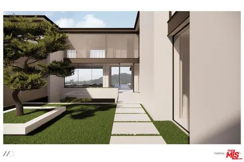 a living room with furniture and a open kitchen view