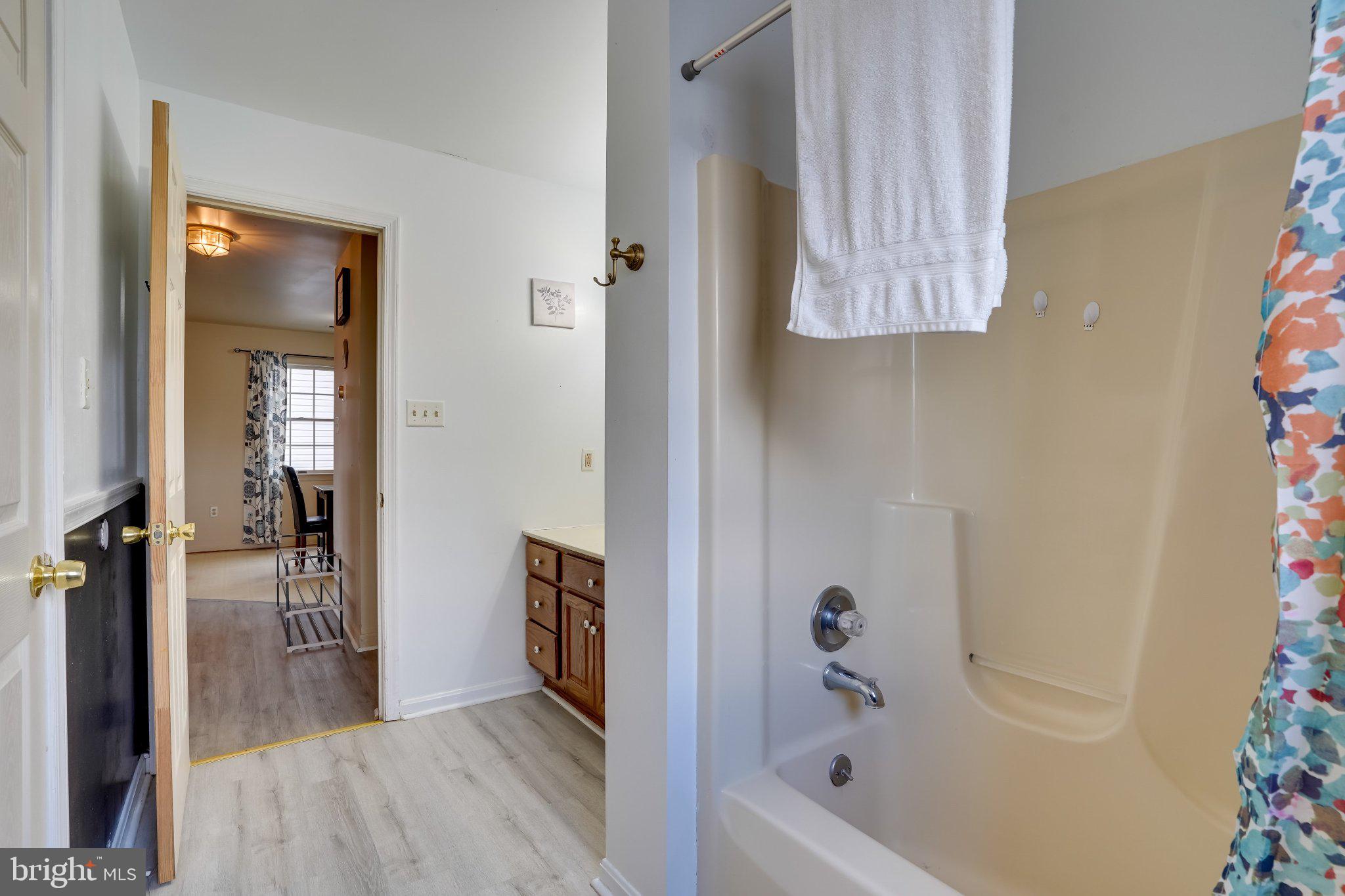 713-715 Medway Road Hagerstown, MD 21740 - Photo 11 of 43 a bathroom with a tub and shower