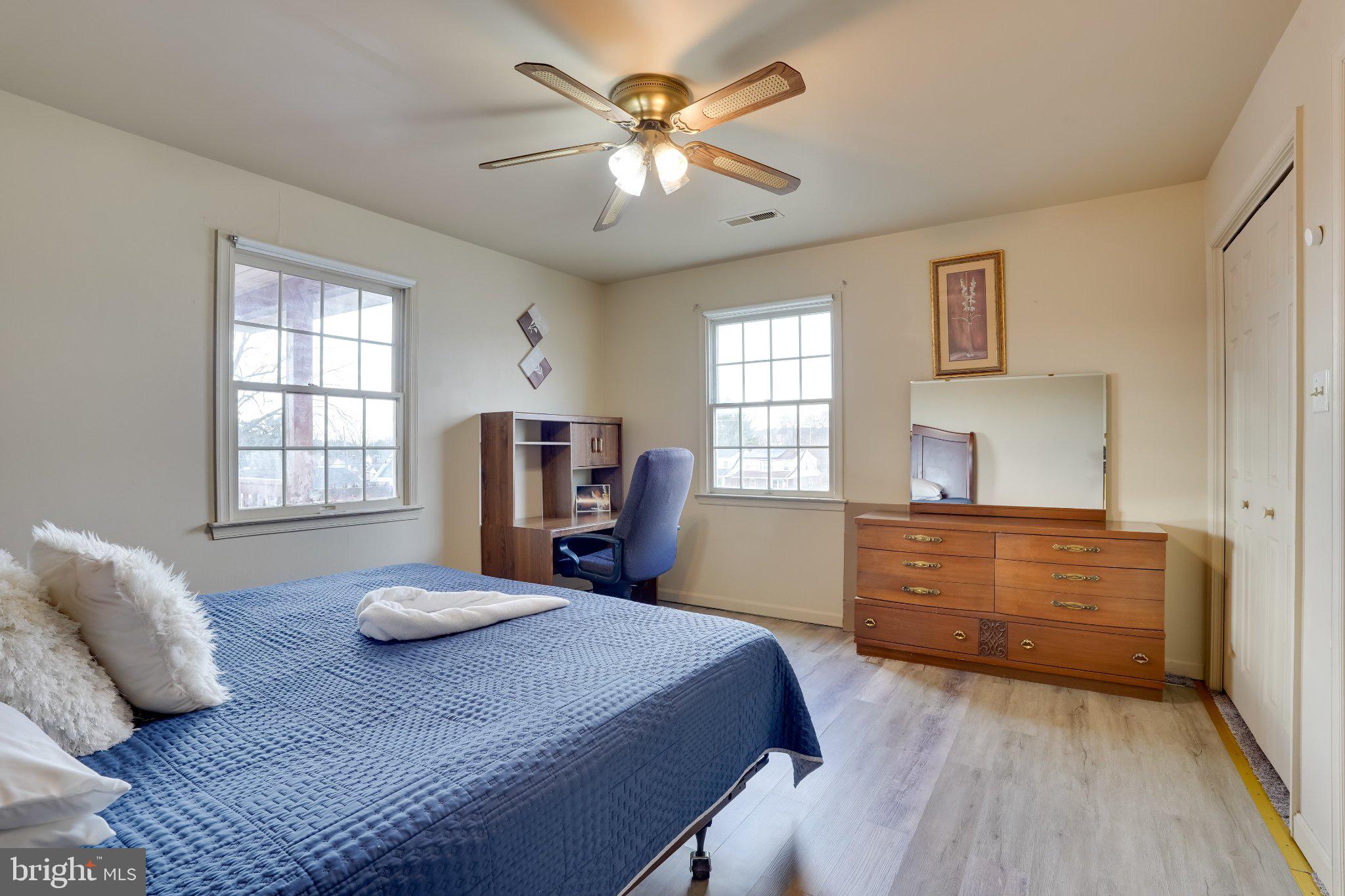 713-715 Medway Road Hagerstown, MD 21740 - Photo 14 of 43 a bedroom with a bed and wooden floor