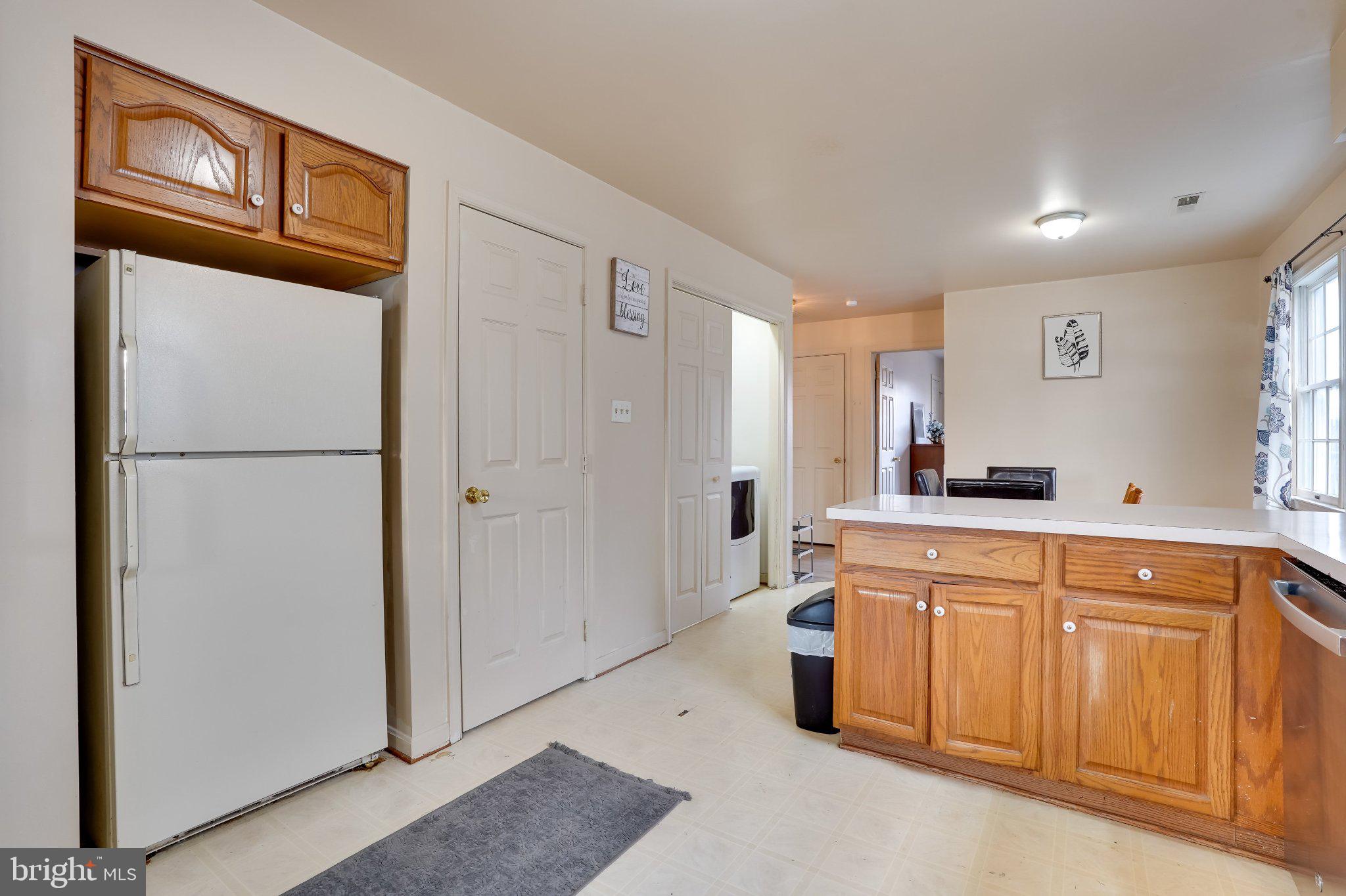 713-715 Medway Road Hagerstown, MD 21740 - Photo 17 of 43 a kitchen with stainless steel appliances granite countertop a refrigerator and a sink
