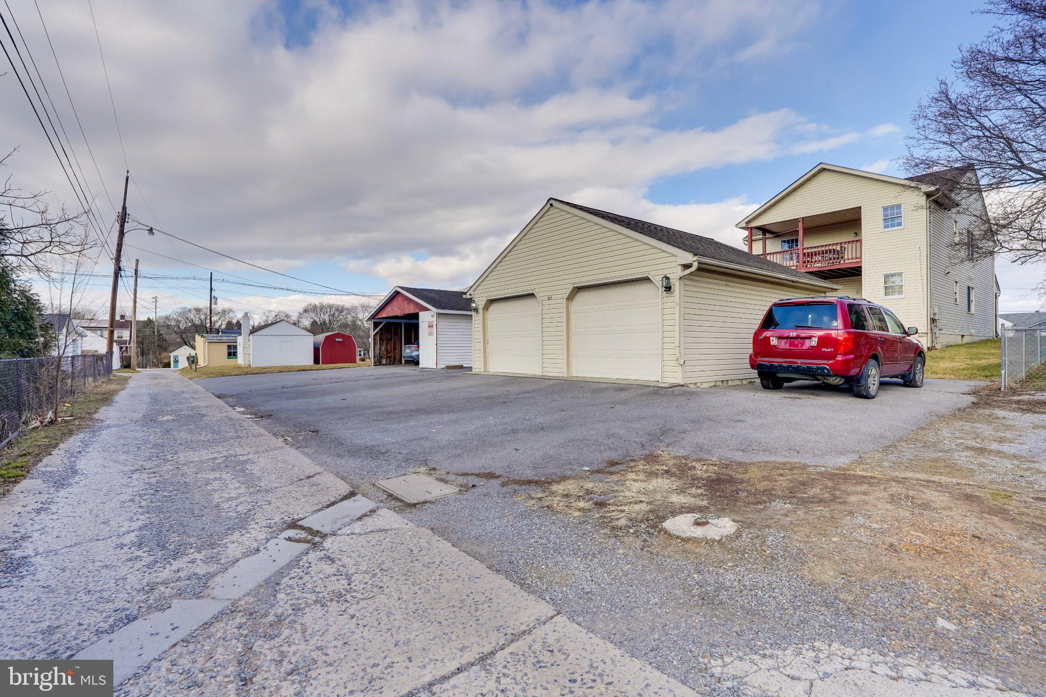 713-715 Medway Road Hagerstown, MD 21740 - Photo 28 of 43 a car parked in front of a house