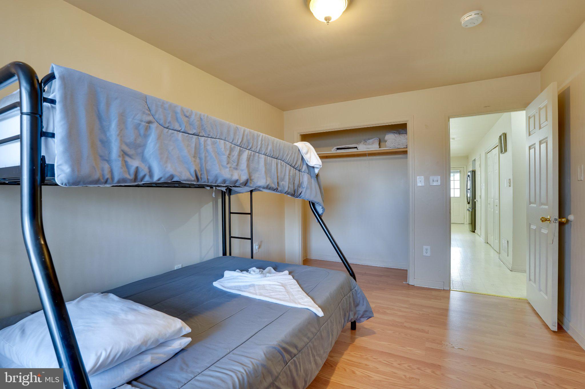 713-715 Medway Road Hagerstown, MD 21740 - Photo 32 of 43 a bedroom with a bed and a mirror