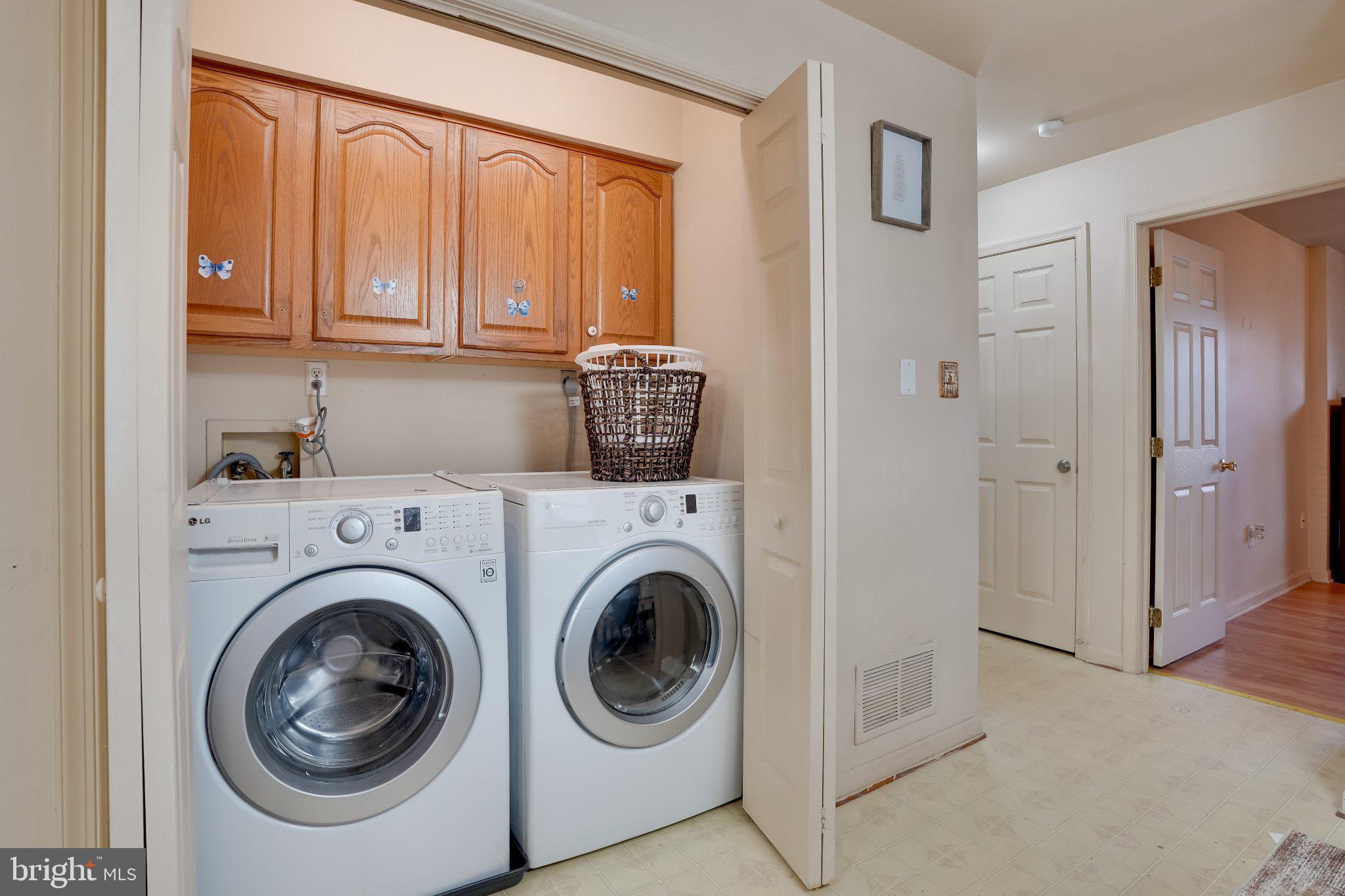 713-715 Medway Road Hagerstown, MD 21740 - Photo 37 of 43 a view of a hallway with washer and dryer