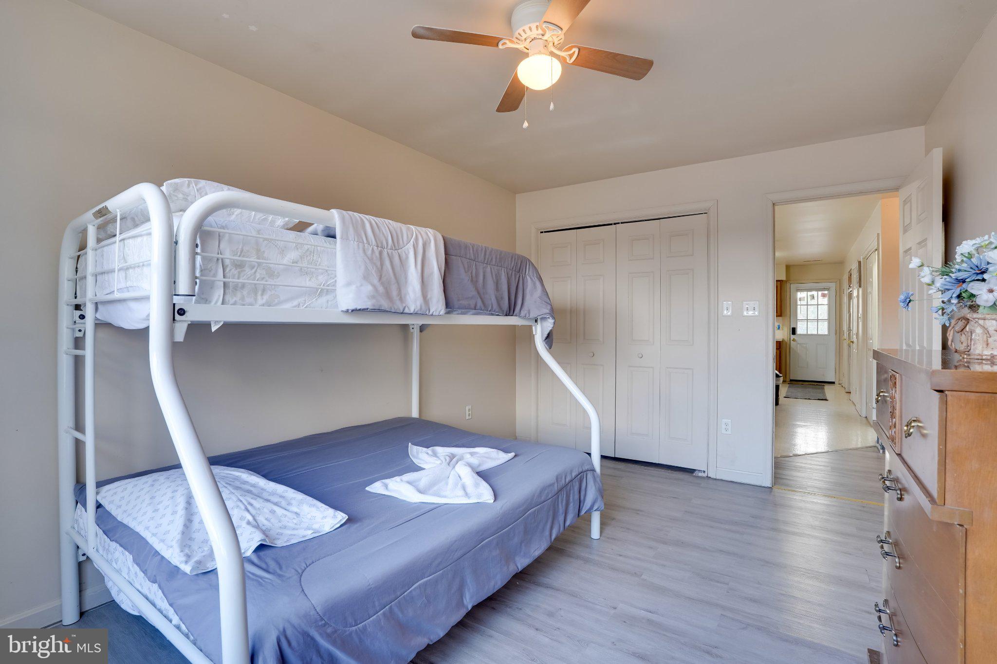 713-715 Medway Road Hagerstown, MD 21740 - Photo 9 of 43 a living room with furniture and a chandelier