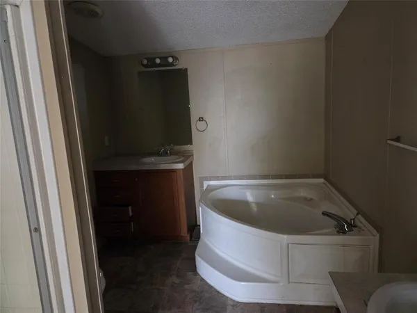 a bath tub sitting in a bathroom