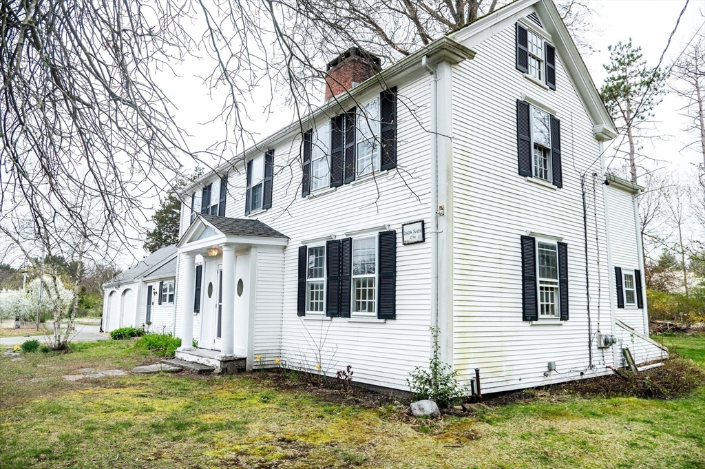 167 Elm Street Hanover, MA 02339 - Photo 2 of 26 a view of a white house with a big yard and large tree