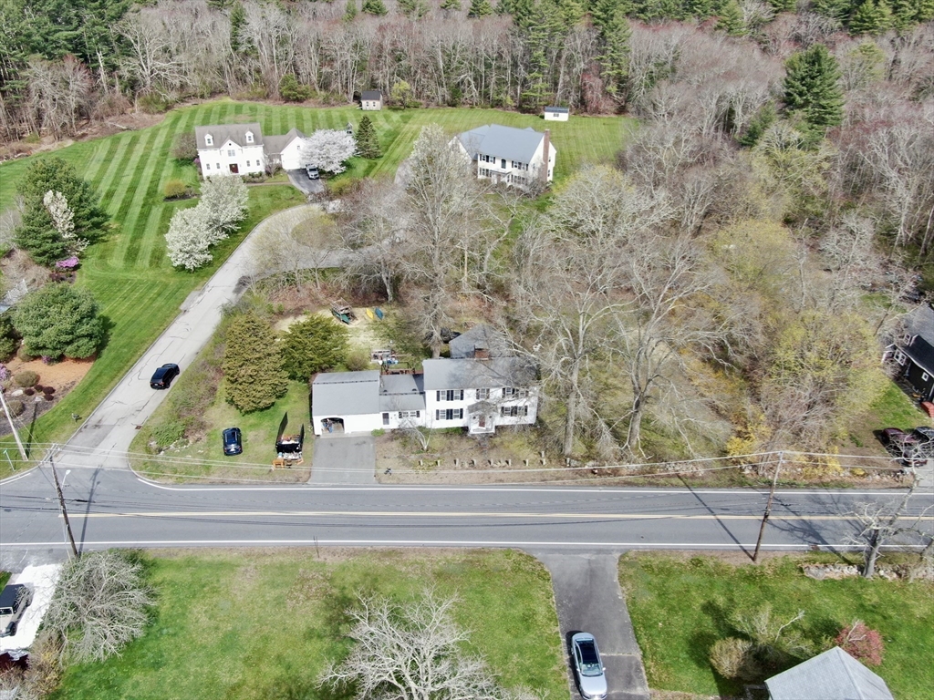 167 Elm Street Hanover, MA 02339 - Photo 23 of 26 a view of a lake with a building in the background