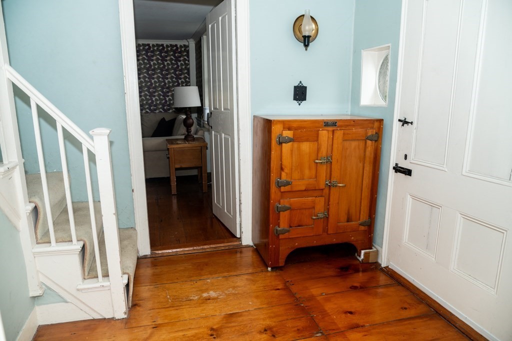 167 Elm Street Hanover, MA 02339 - Photo 7 of 26 a view of a hallway to a livingroom and a hallway