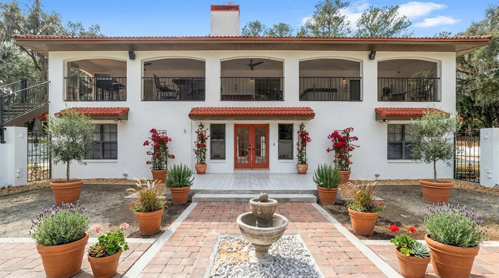 a front view of a house with patio