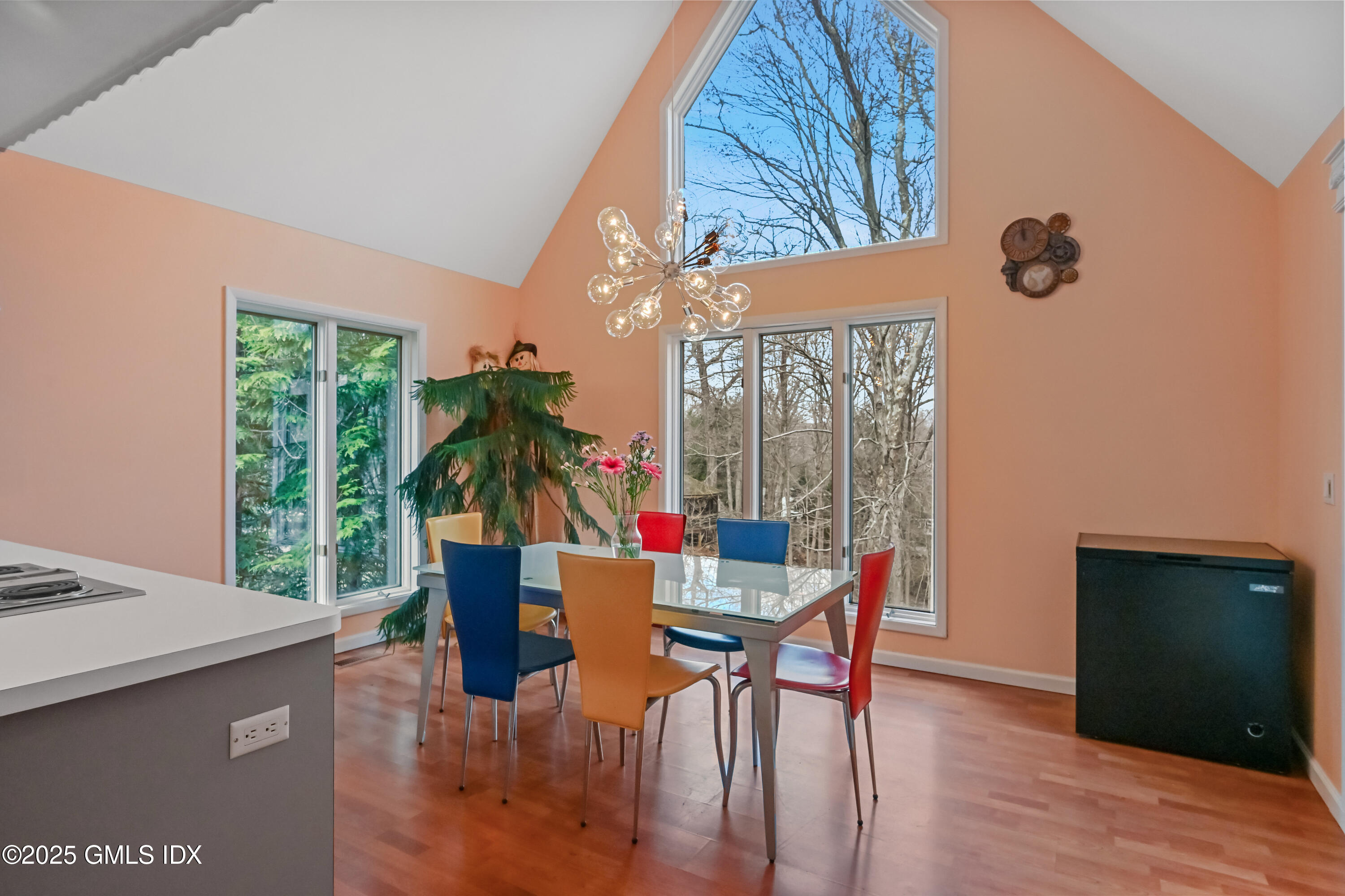 681 River Road Cos Cob, CT 06807 - Photo 17 of 44 a dining room with furniture and wooden floor