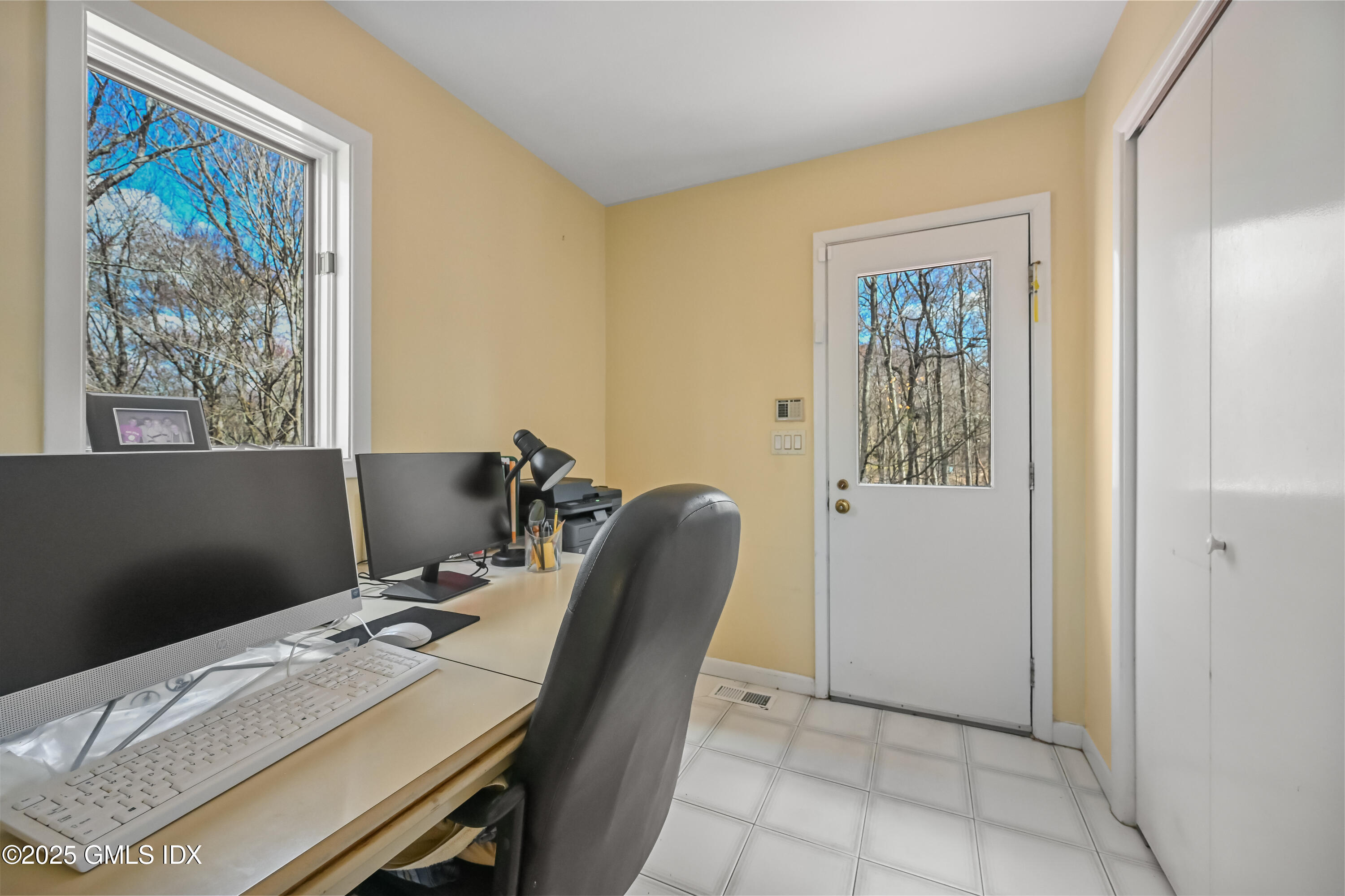 681 River Road Cos Cob, CT 06807 - Photo 22 of 44 a workspace with furniture and window