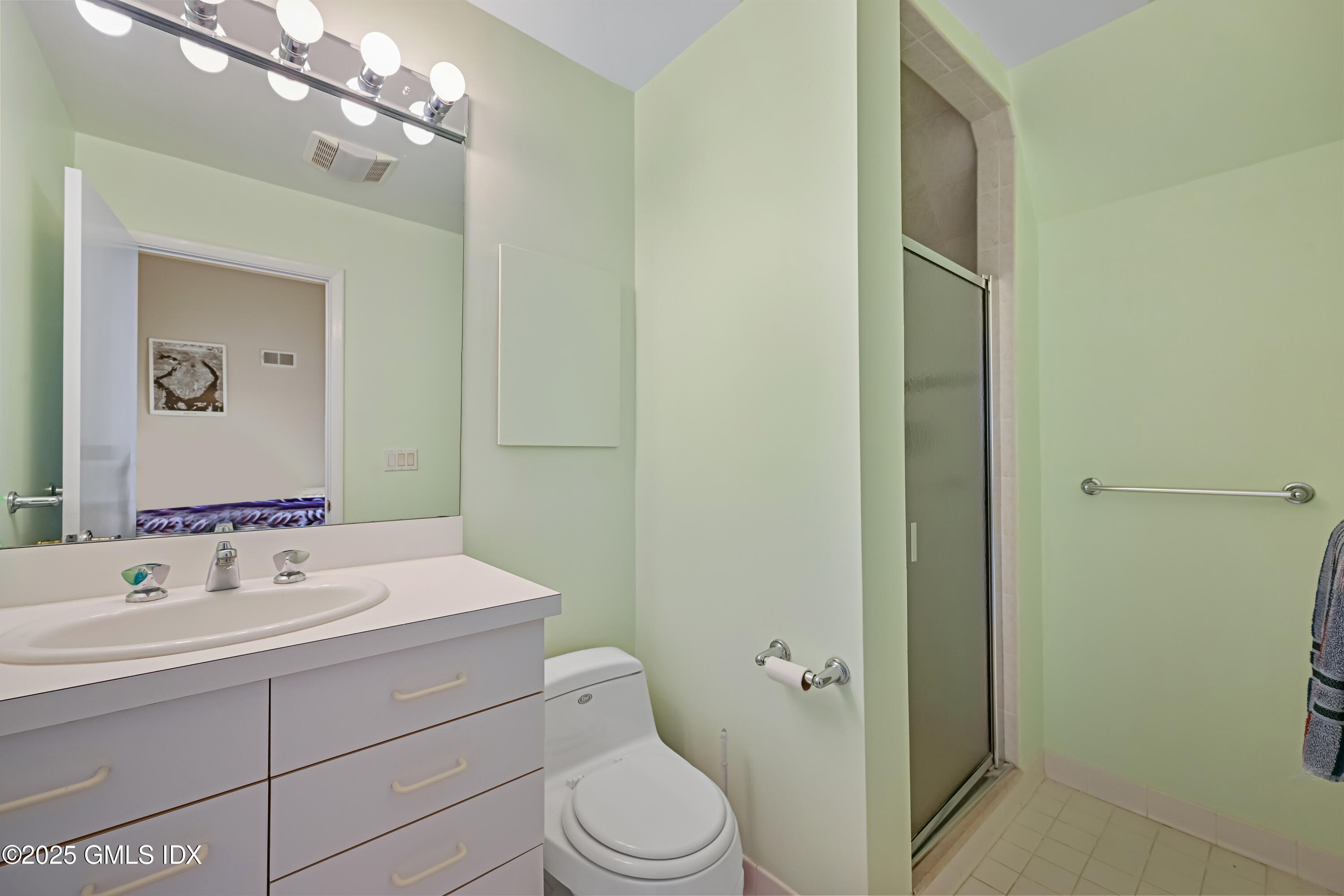 681 River Road Cos Cob, CT 06807 - Photo 33 of 44 a bathroom with a sink a toilet and shower