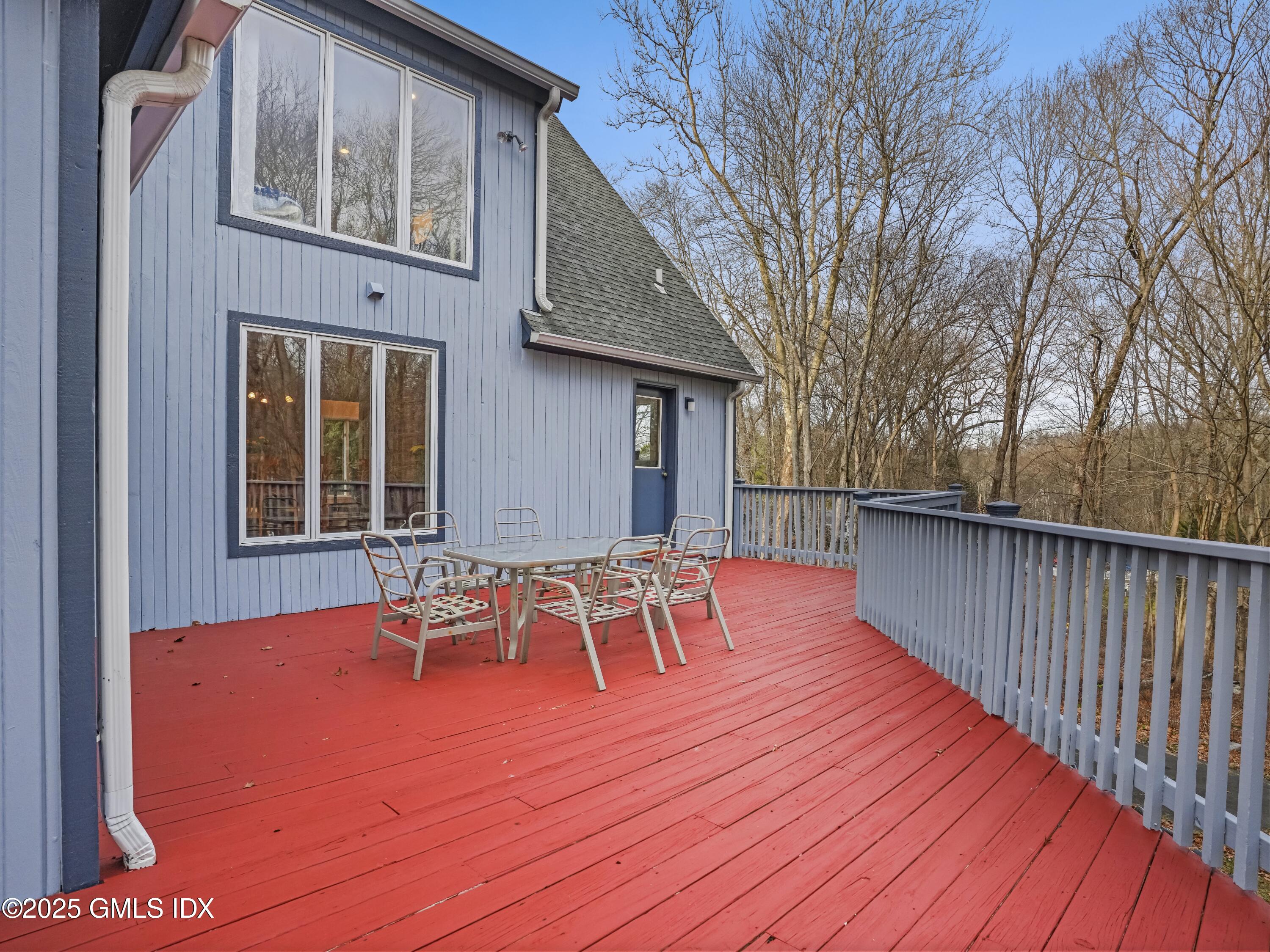 681 River Road Cos Cob, CT 06807 - Photo 39 of 44 a view of a house with wooden deck