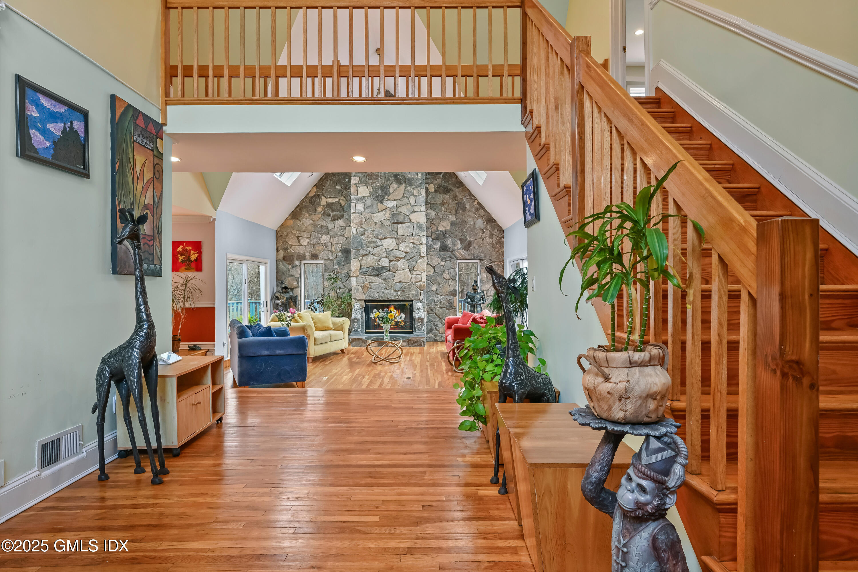 681 River Road Cos Cob, CT 06807 - Photo 6 of 44 a view of living room filled with furniture and floor to ceiling window
